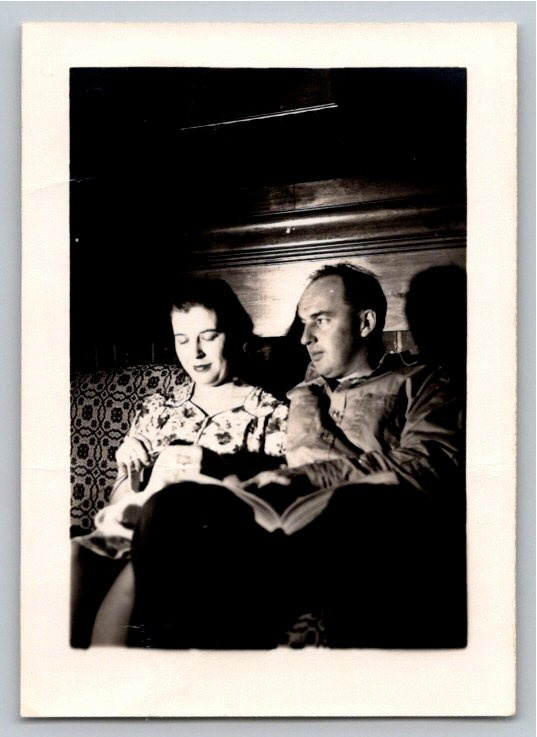 Vintage 1950s Black & White Snapshot: Couple Reading on Sofa