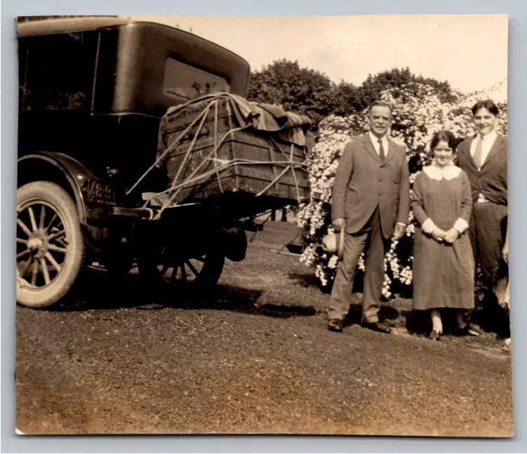 Vintage 1920s Family Road Trip Snapshot with Tied Car Trunk