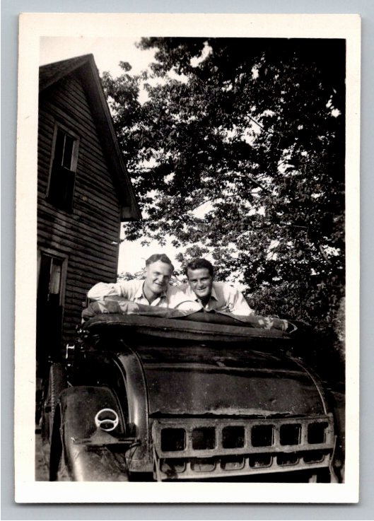 Vintage 1930s Snapshot: Two Men Leaning in Ford Model A Roadster