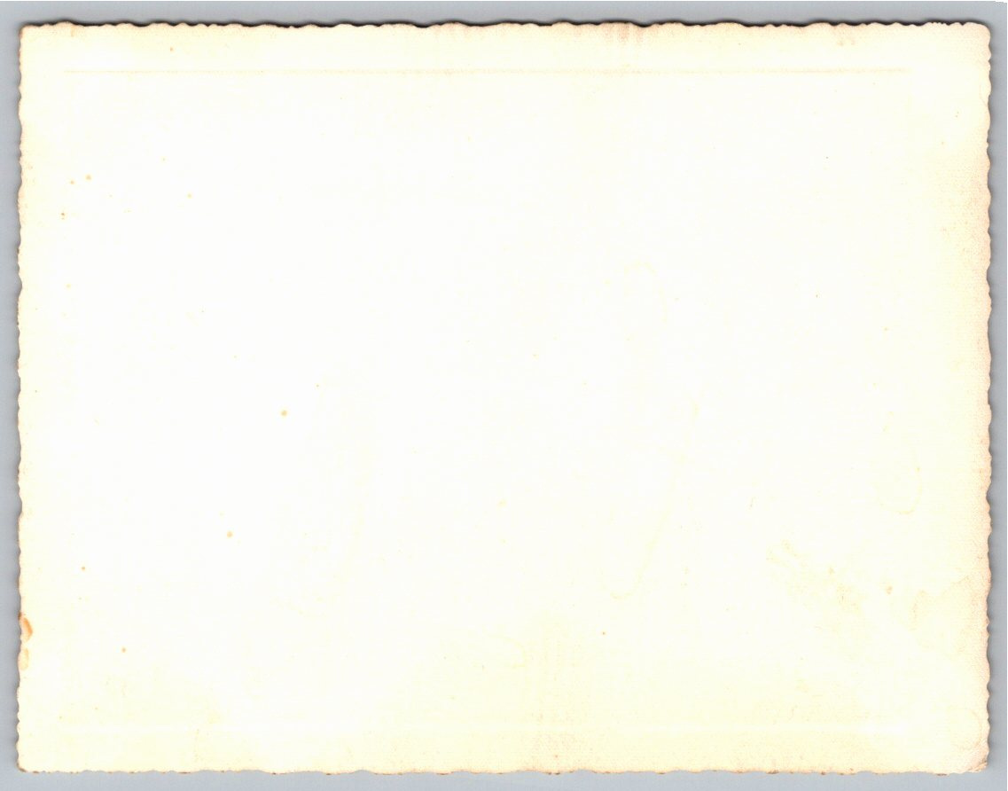 1942 Vintage Christmas Photo Card: Giant Prop Books & Studio - Back / Reverse View