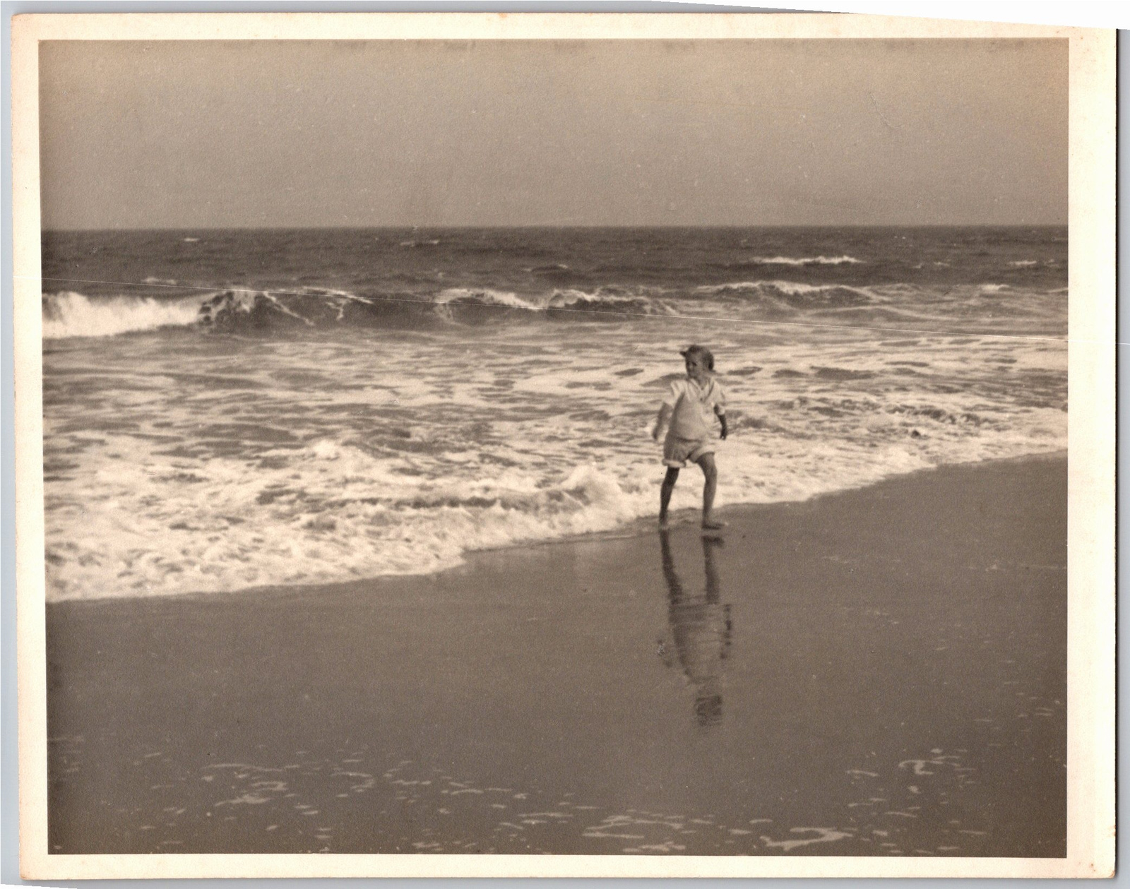Vintage 1930s Ocean Beach Photograph: Child Playing in Waves