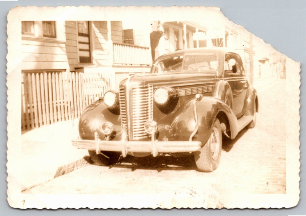 Vintage 1938 Buick Automobile Snapshot: Urban Street Scene Photo