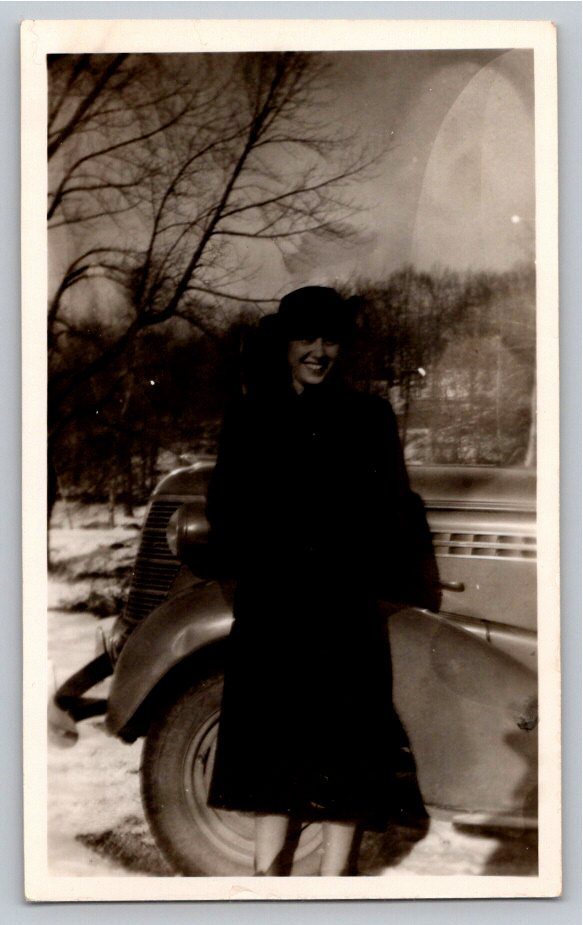 Vintage 1938 B&W Snapshot Photo: Woman Smiling with Classic Car